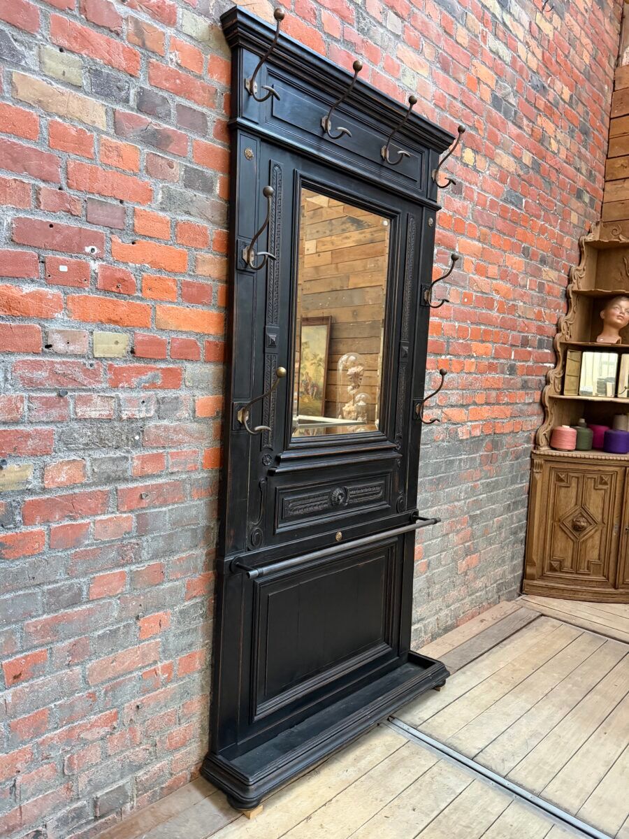 Patinated oak wardrobe from the early 20th century.