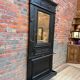 Patinated oak wardrobe from the early 20th century.