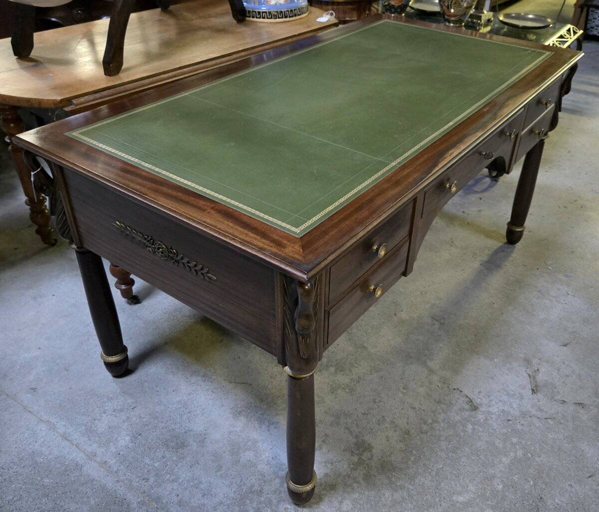 Empire-style minister's desk with swan necks in mahogany.