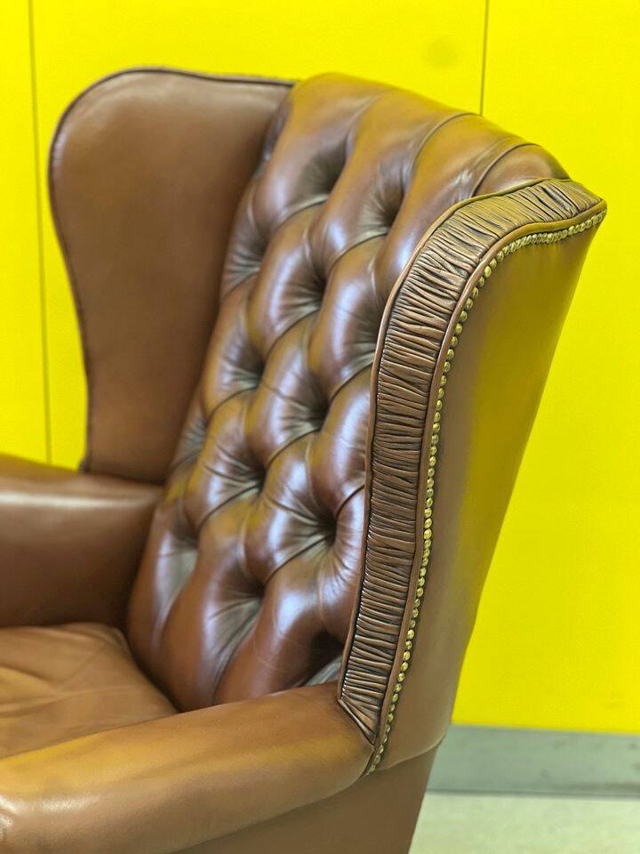 Fauteuil Chesterfield traditionnel anglais en cuir