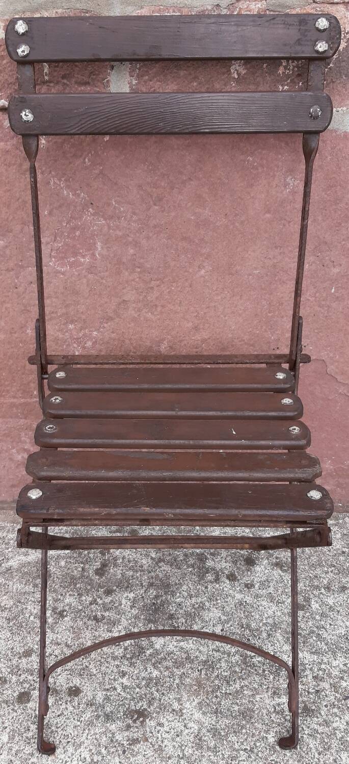 Foldable wrought iron chair