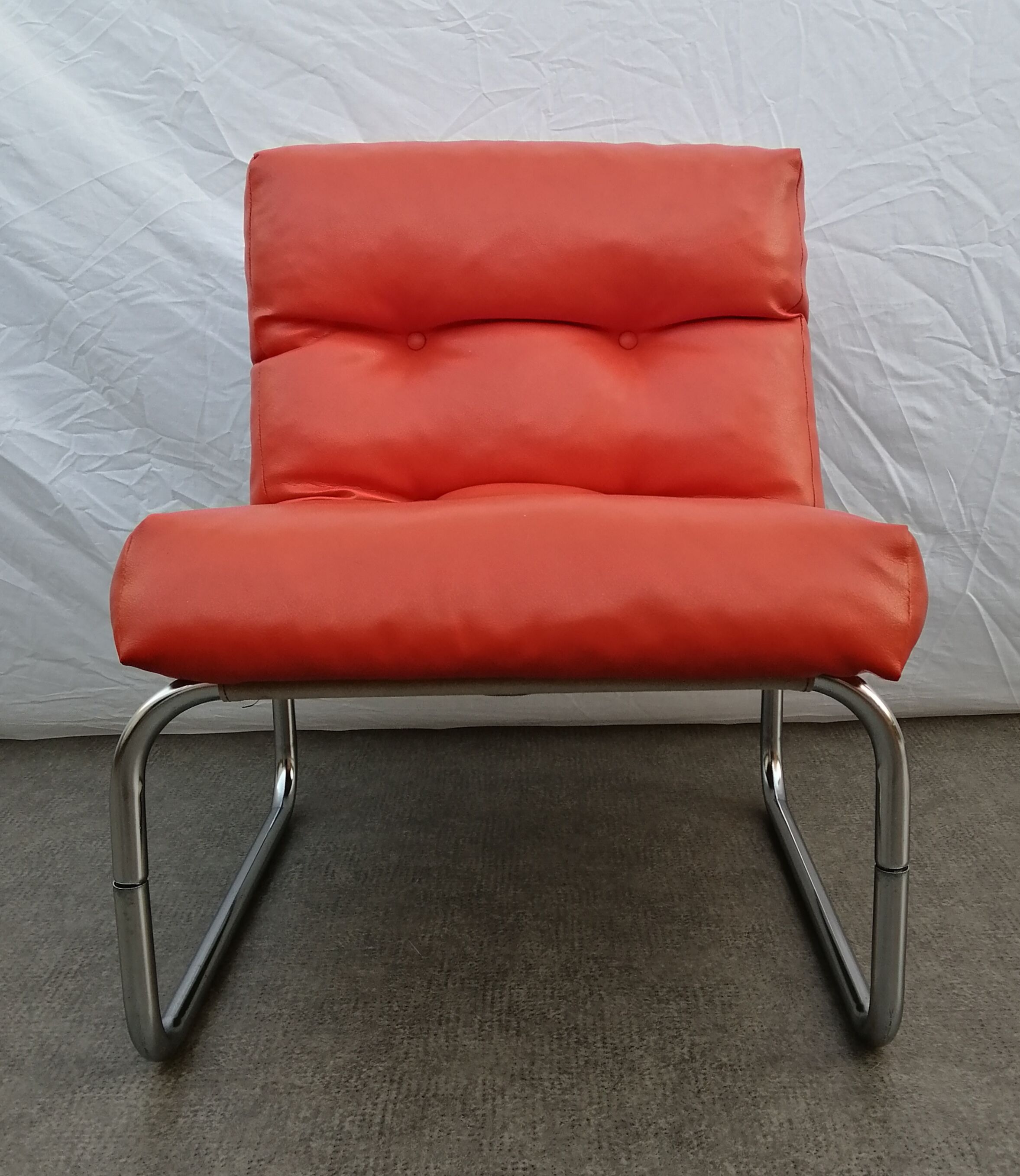Orange pixi model armchair designed for Ikea by designer Gillis Lundgren 1970