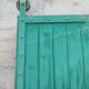 Old wooden door with pulley