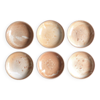 Six hollow potter's plates in sandstone from Saint Amand en Puisaye