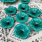 Salad bowl and small bowls in leaf-shaped slipware