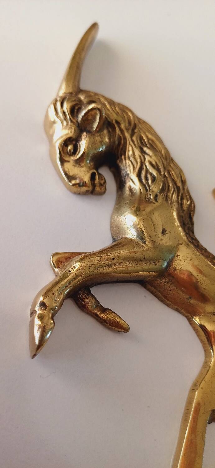 Animal bottle opener in gilded bronze