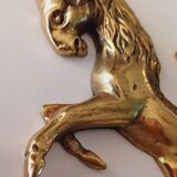 Animal bottle opener in gilded bronze