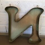 Golden sign letter "N"