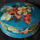 Antique porcelain candy box with floral motifs