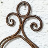 Wrought iron wall shelf
