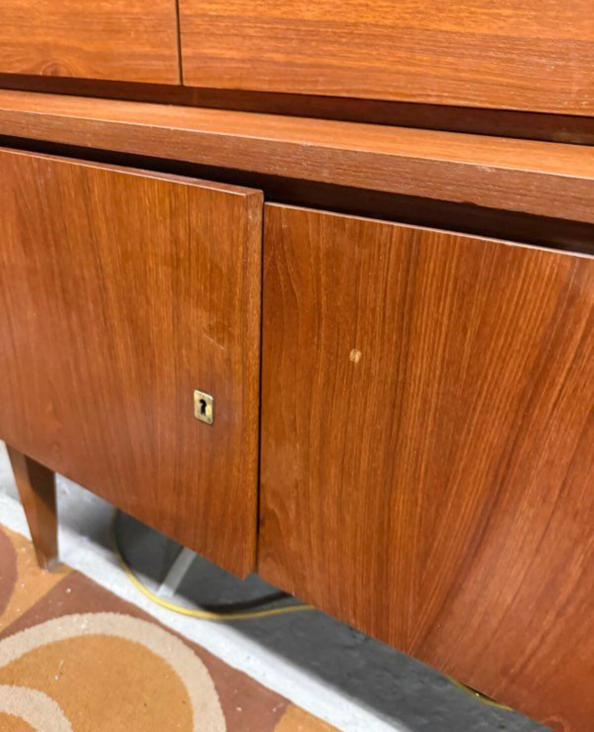 Vintage Scandinavian teak sideboard with compass feet from the 70s