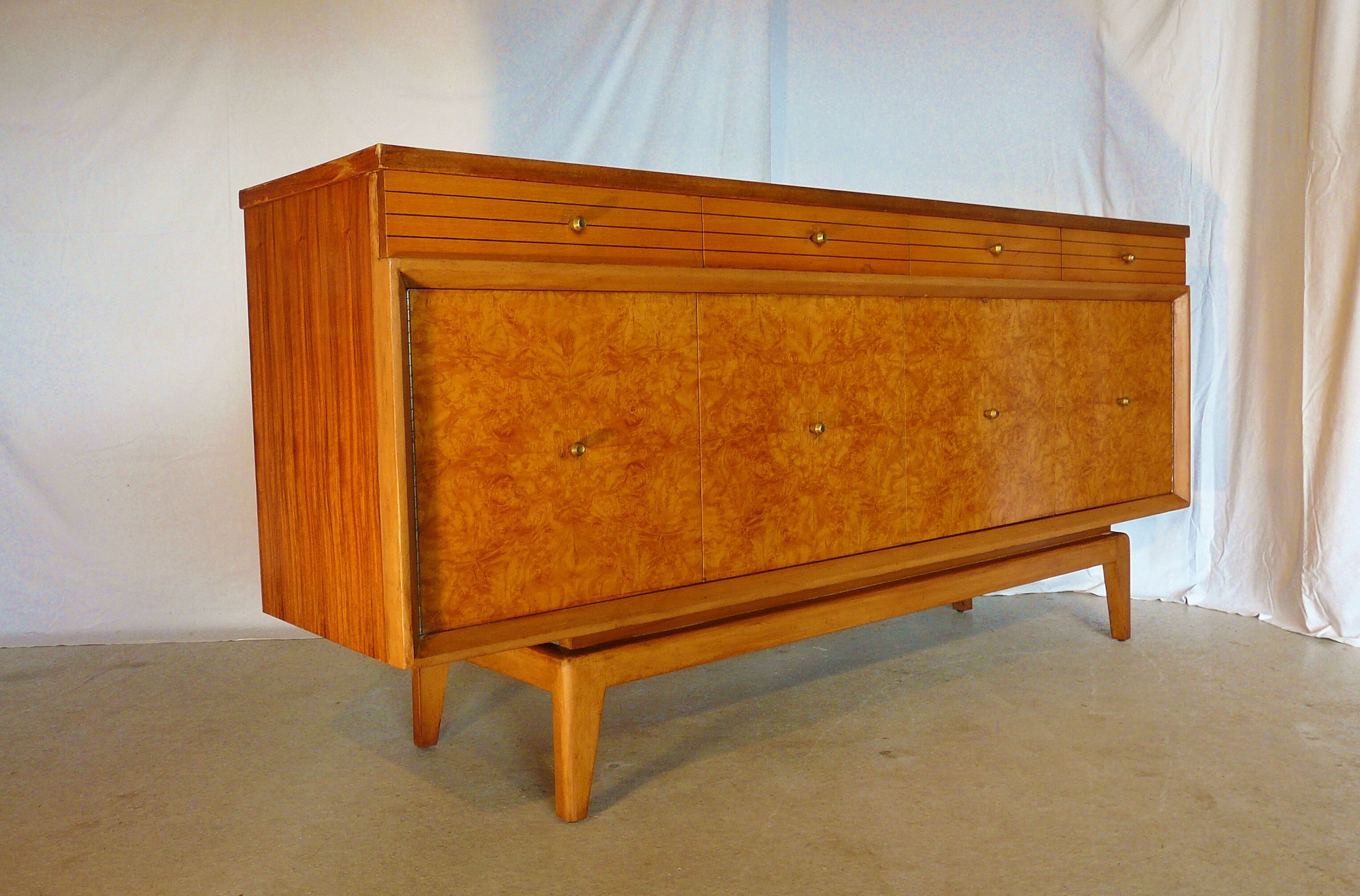 Scandinavian sideboard of blond wood and teak