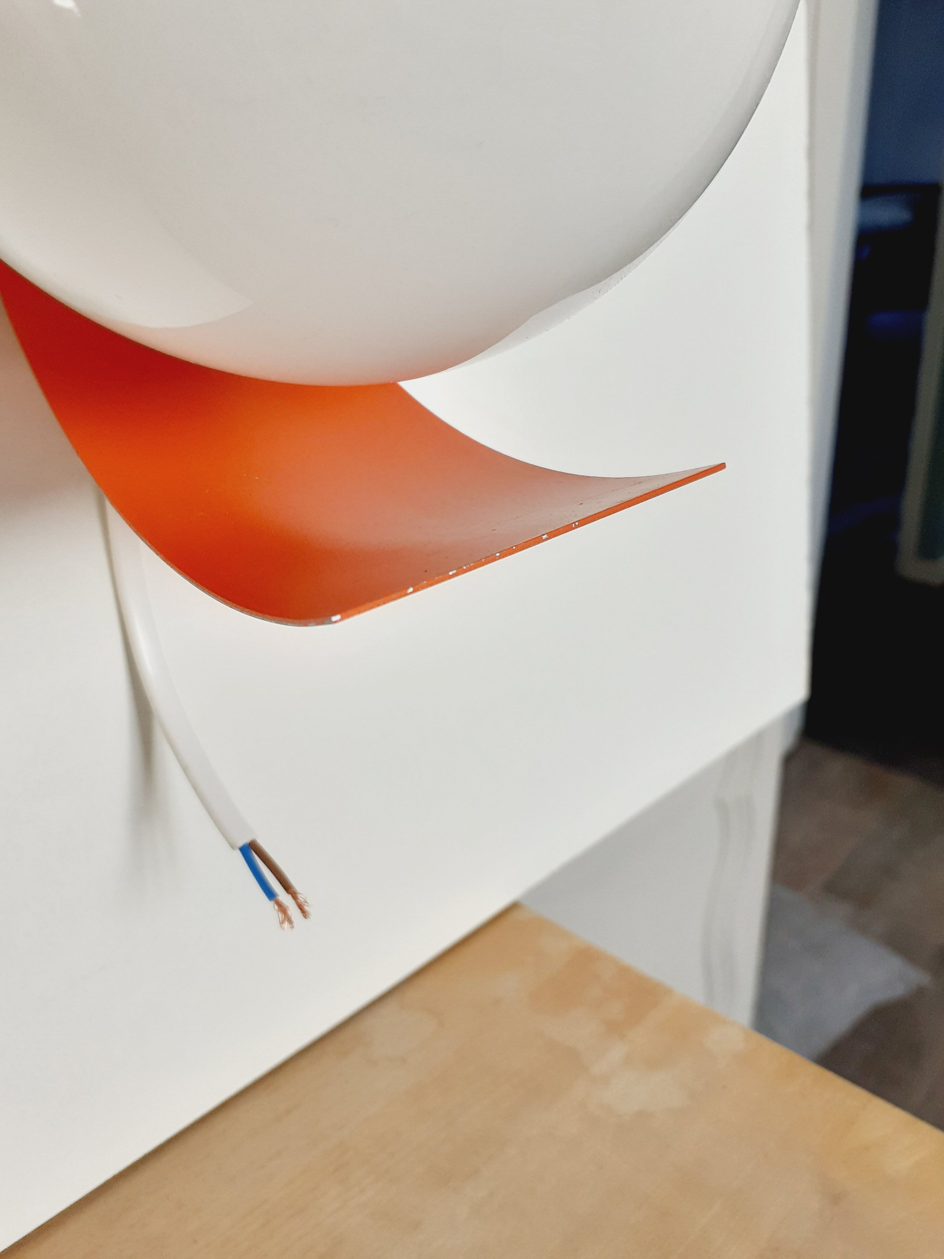 Pair of orange space age wall lamps