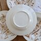 4 vintage deep plates with a brown floral design