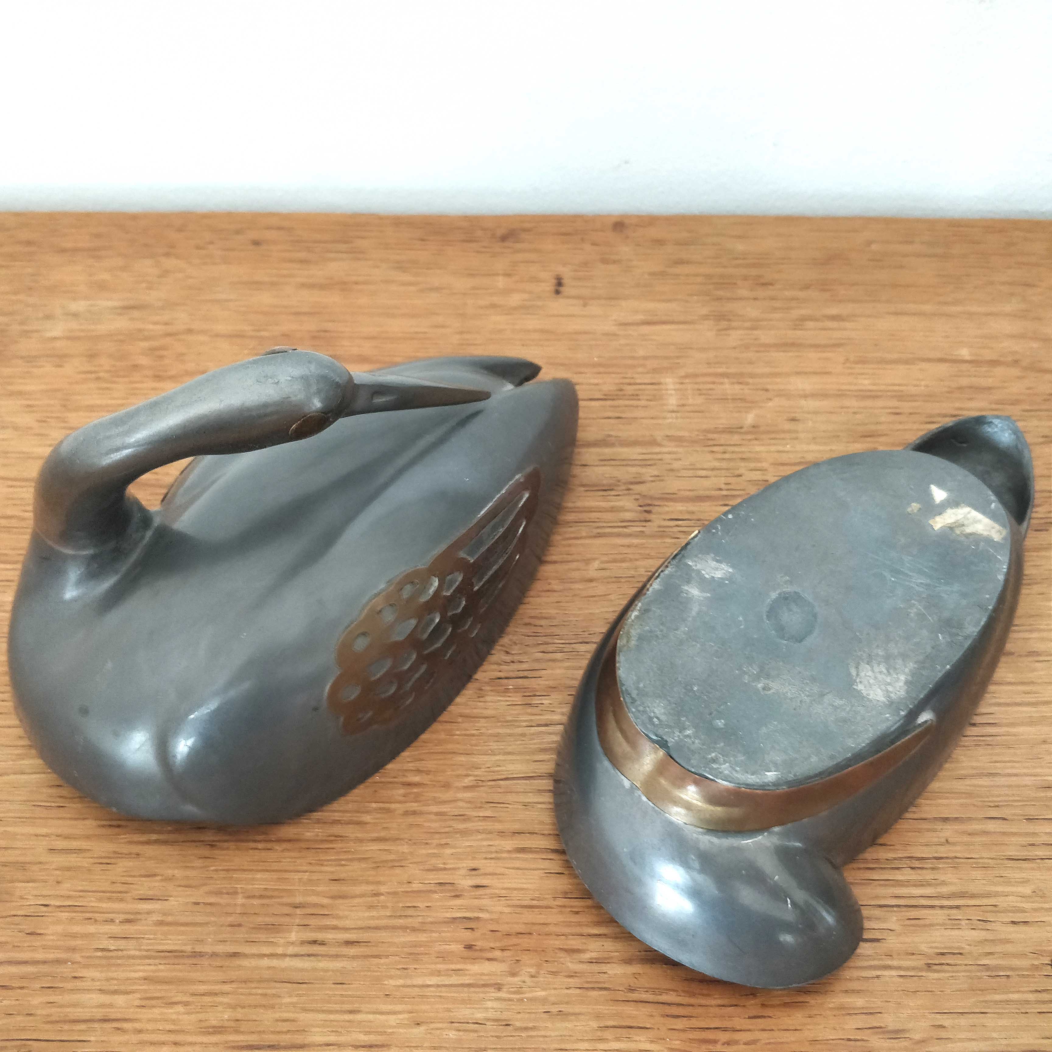 Empty swan tin pocket