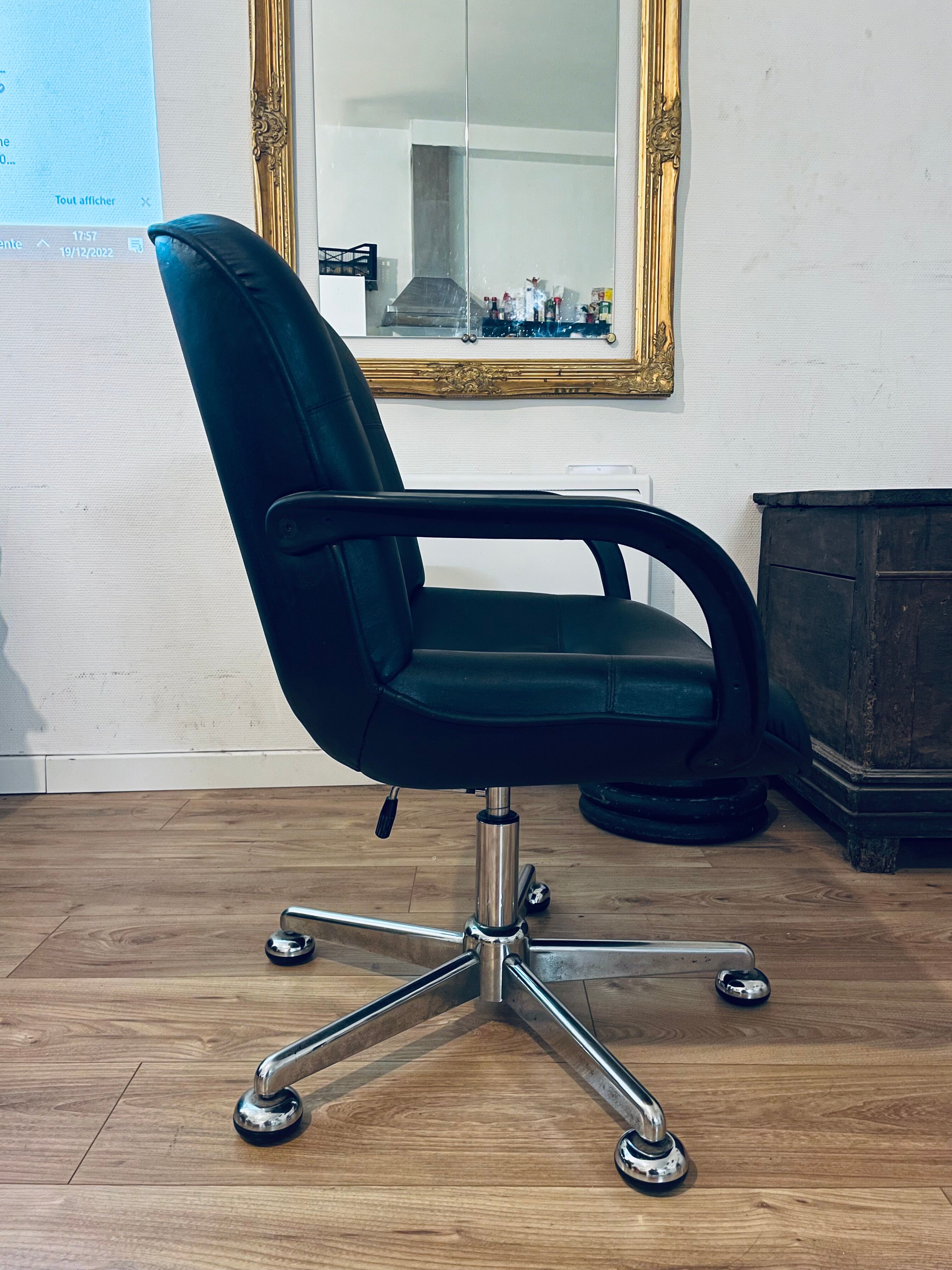 Vintage black leather armchair