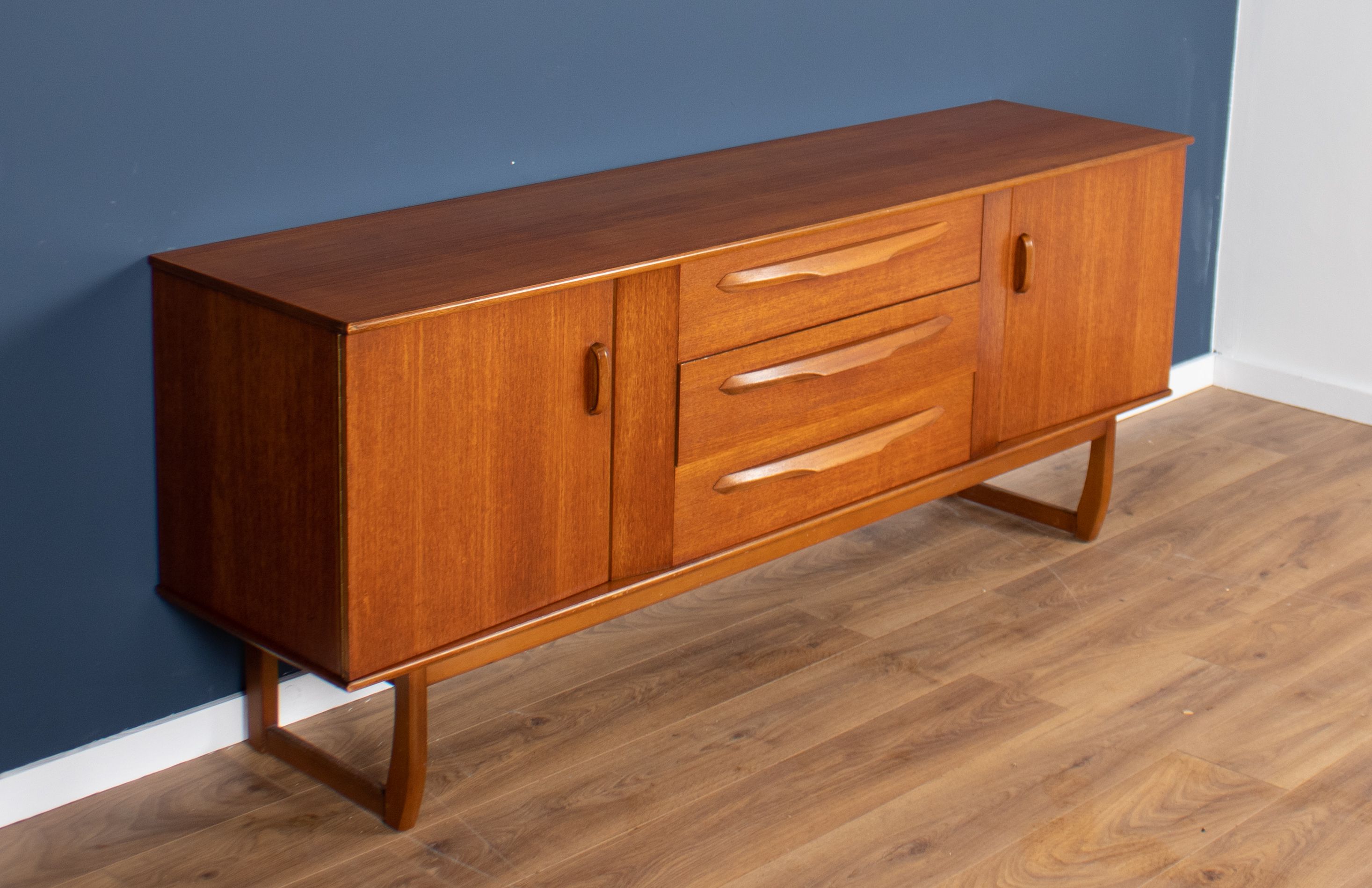 Teak 1960s sideboard with sleigh legs