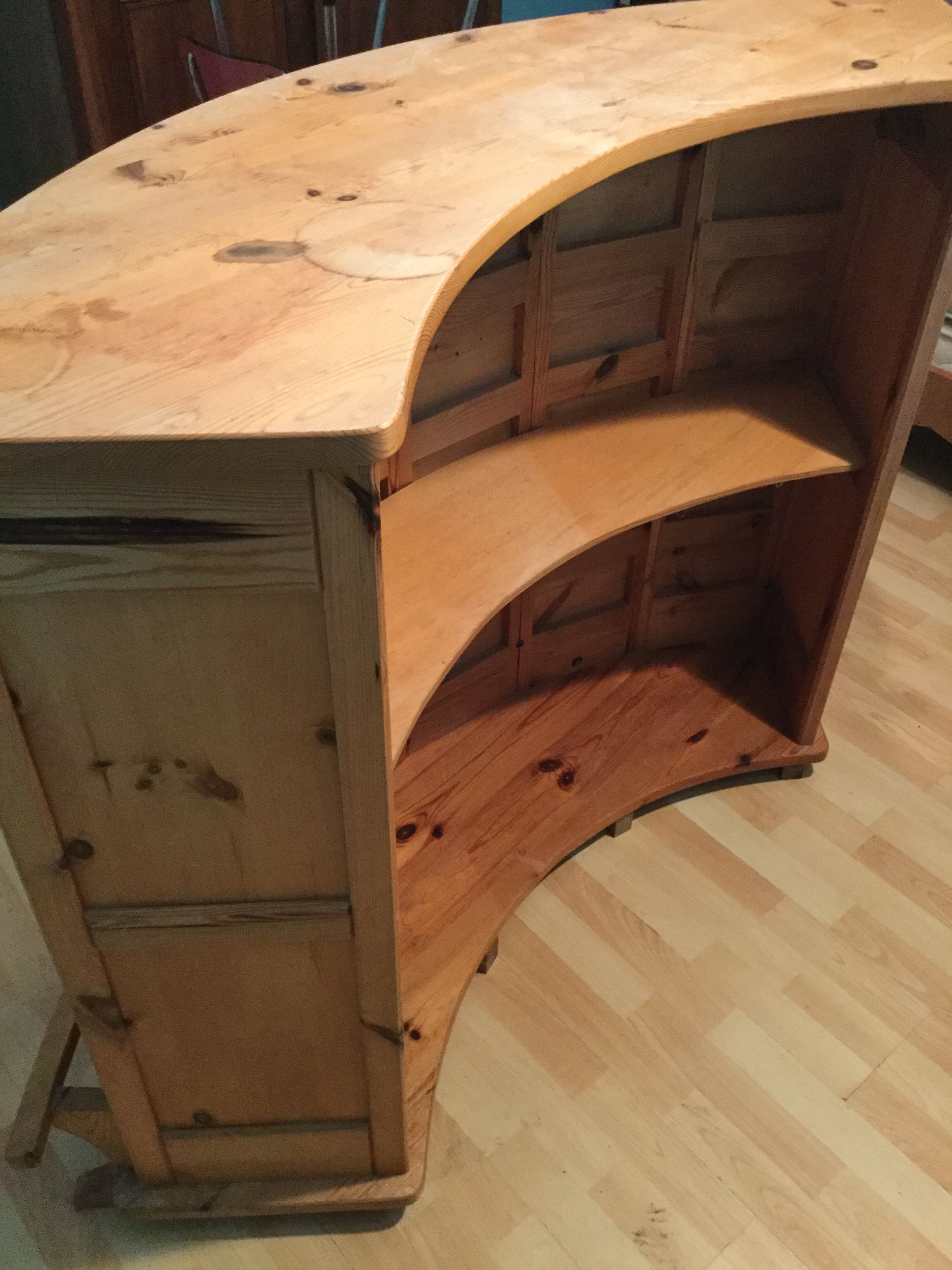 Vintage bar counter with natural wood stools