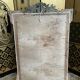 Napoleon iii pediment mirror in gilded stucco and green patina