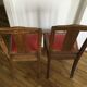 2 chaises vintage en bois et simili cuir rouge