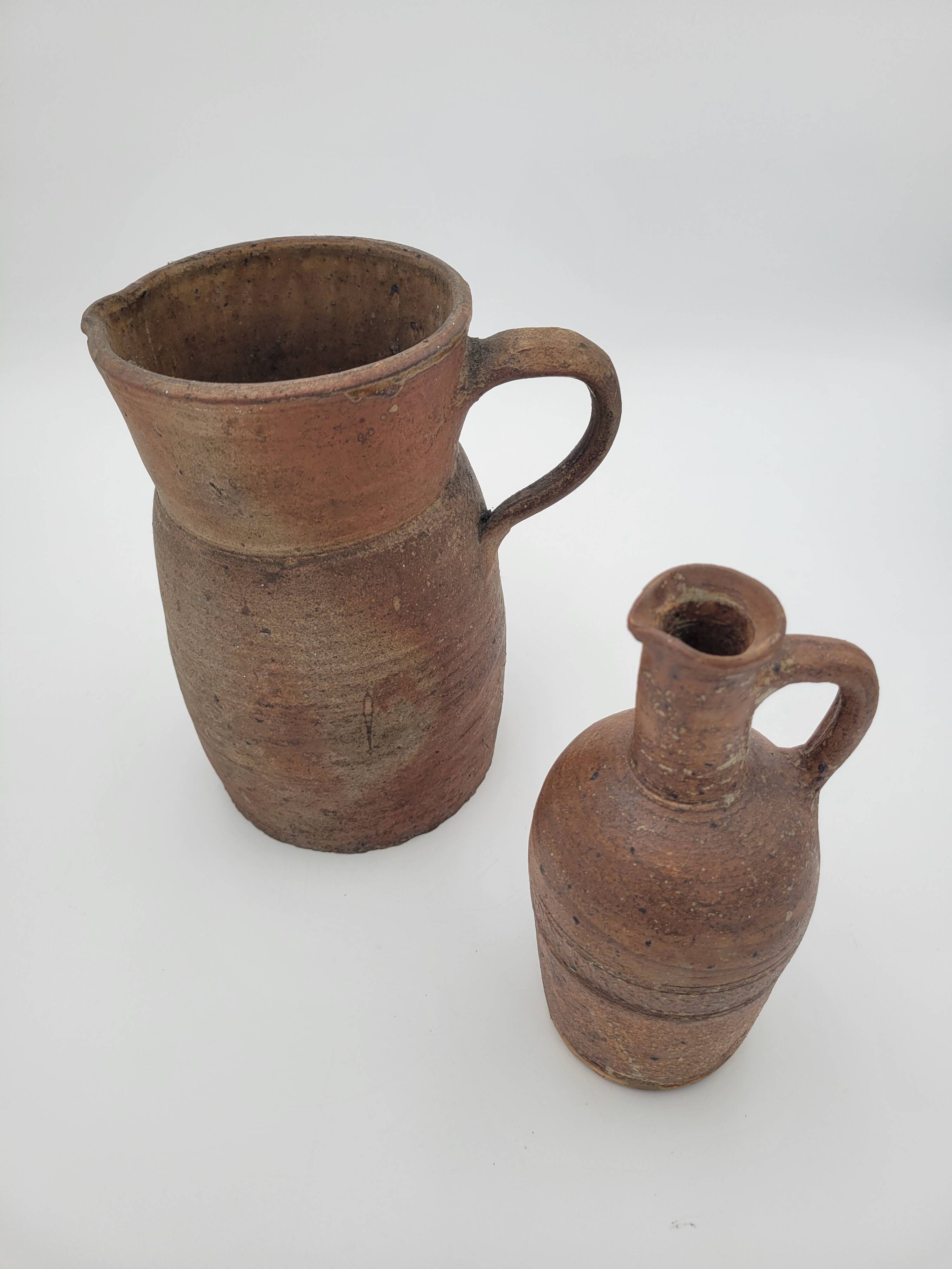 Pair of old terracotta pitchers