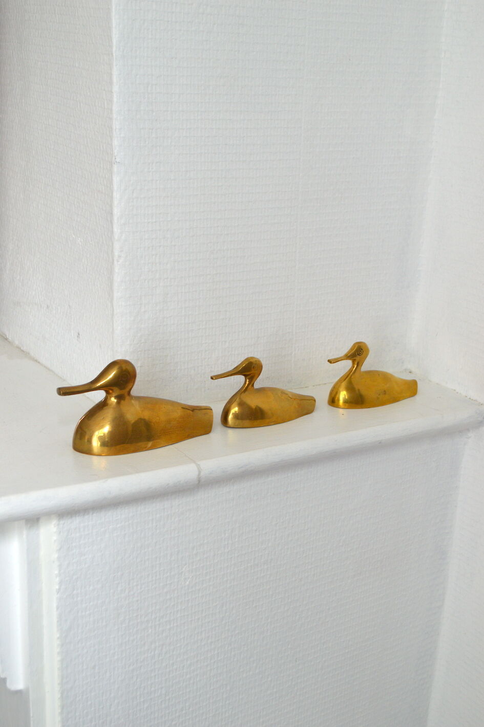 Suite of 3 brass ducks