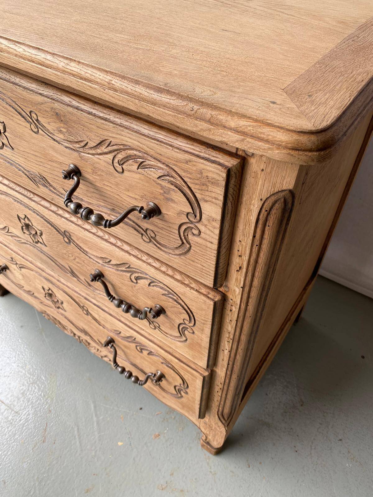 Vintage Louis XV chest of drawers renovated in raw and carved wood