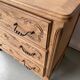 Vintage Louis XV chest of drawers renovated in raw and carved wood