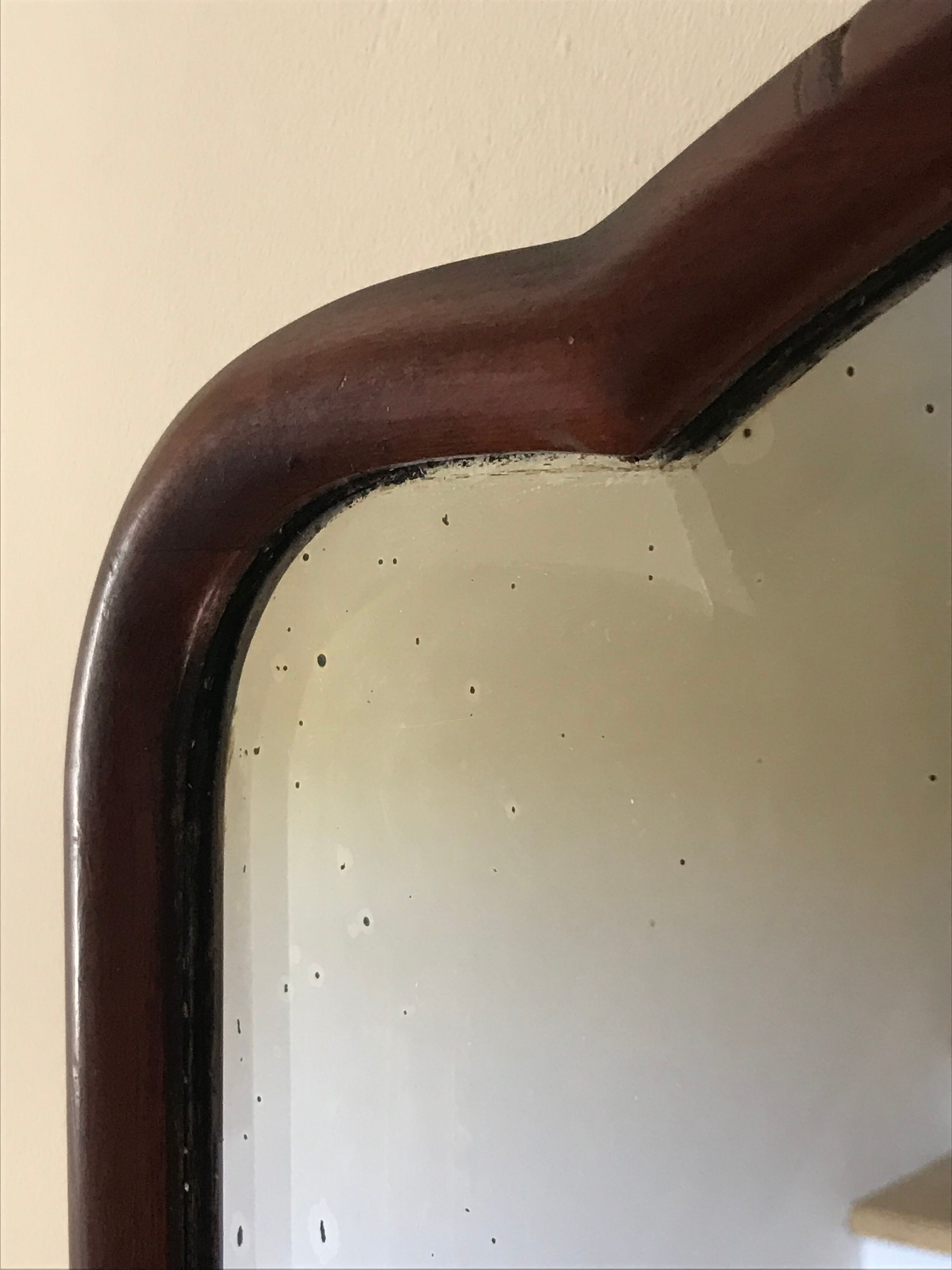 Beveled mahogany mirror, circa 1930