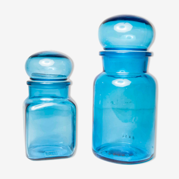 2 blue dash glass jars