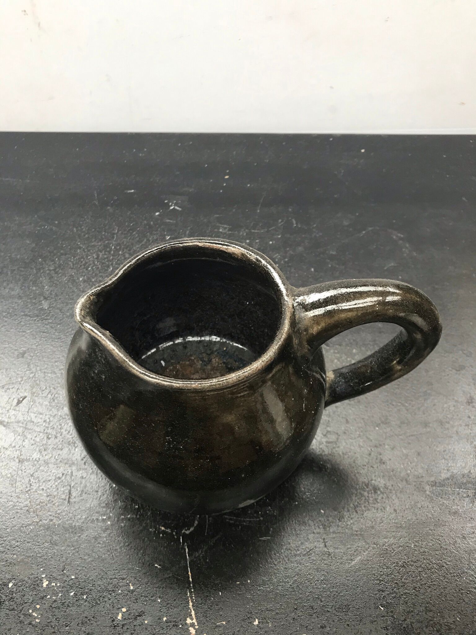 Former black ceramics pitcher 70