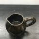 Former black ceramics pitcher 70