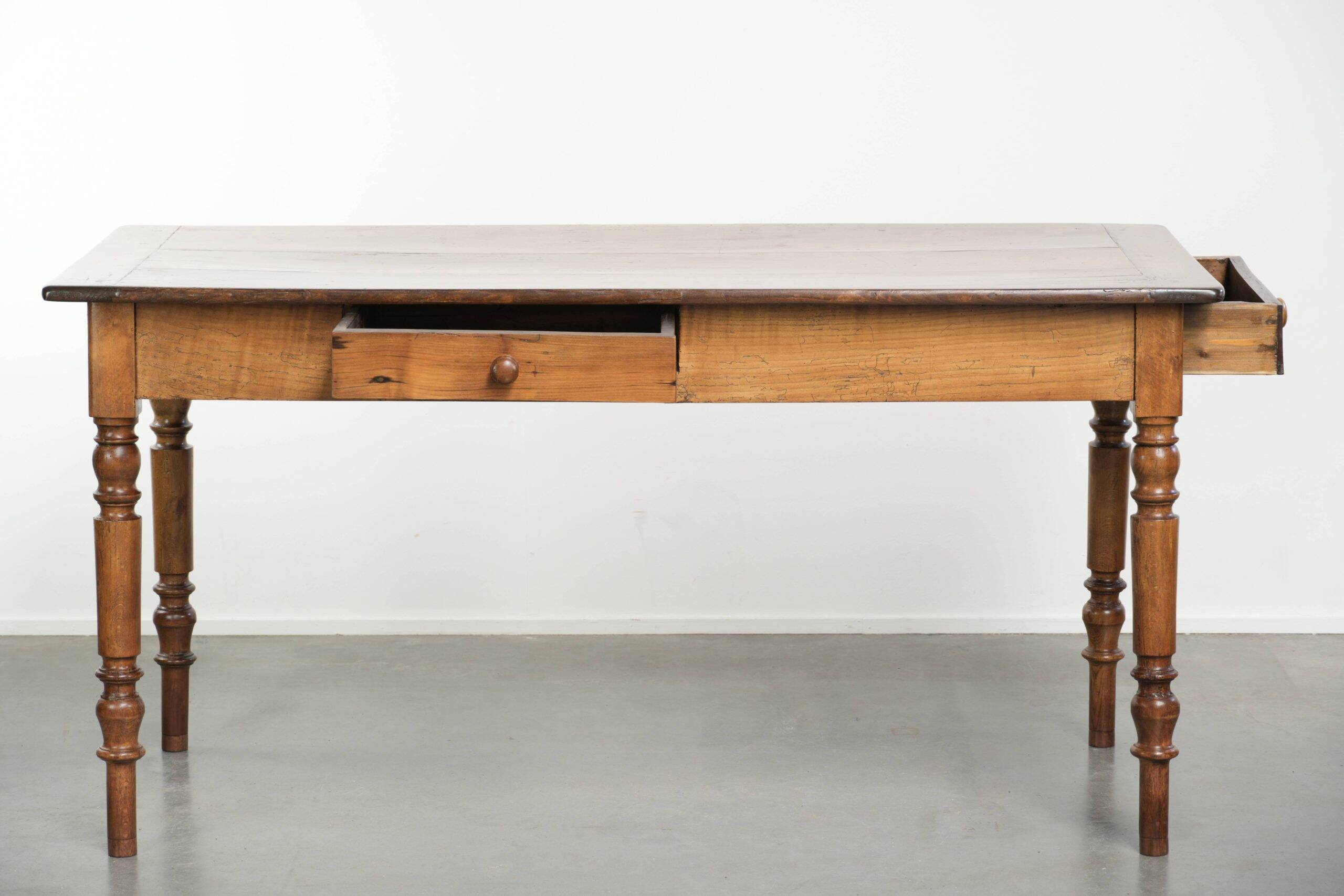 Antique French cherry wood dining table from the 19th century