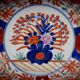 Japanese Imari porcelain dish with radiant decoration and scalloped edges