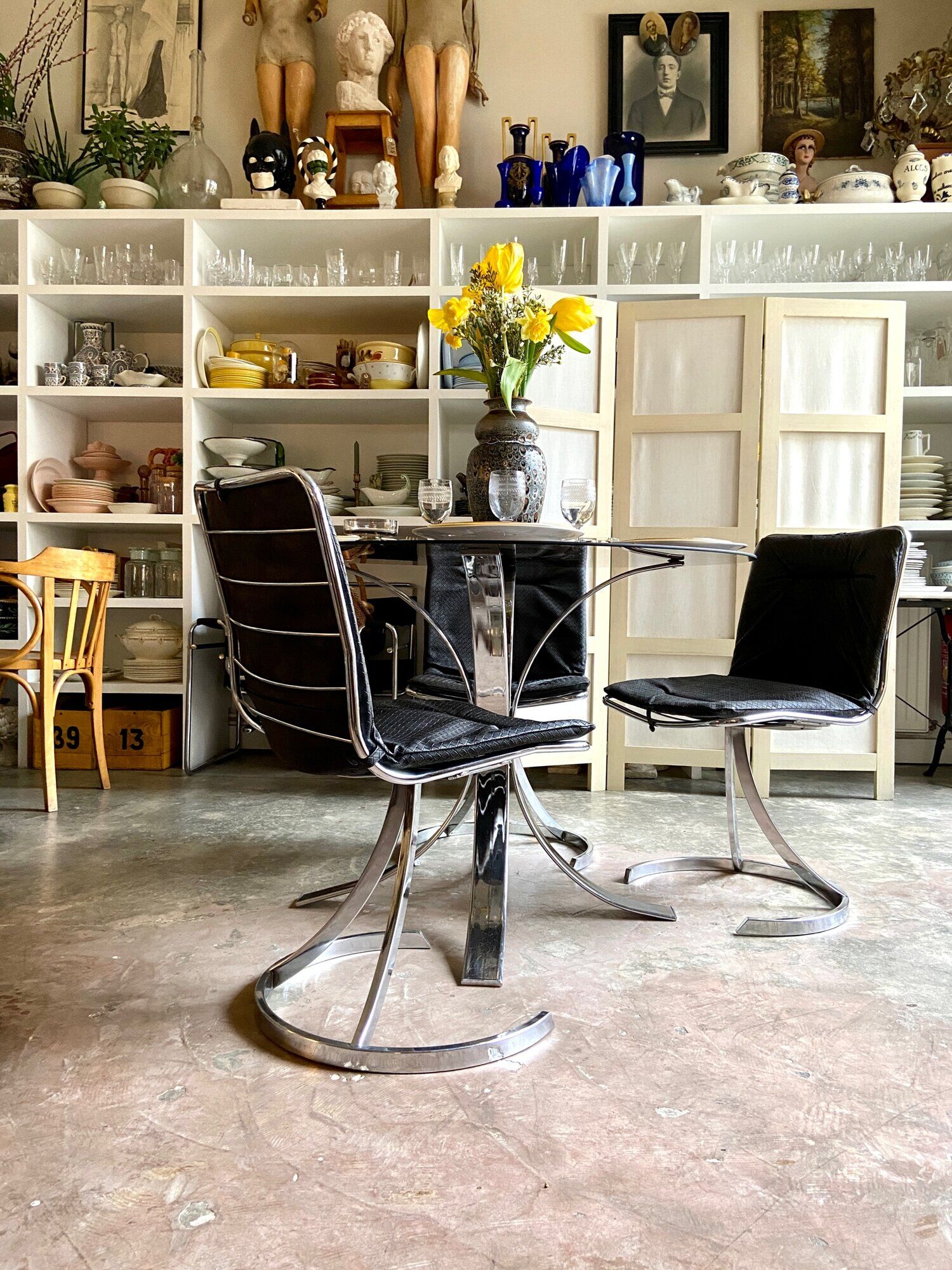 2 chairs in chromed metal and black woven skaï 1970s