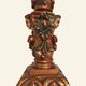 Renaissance table lamp in polychrome carved wood with cherubs.