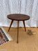 Pretty little vintage round table with tapered legs.