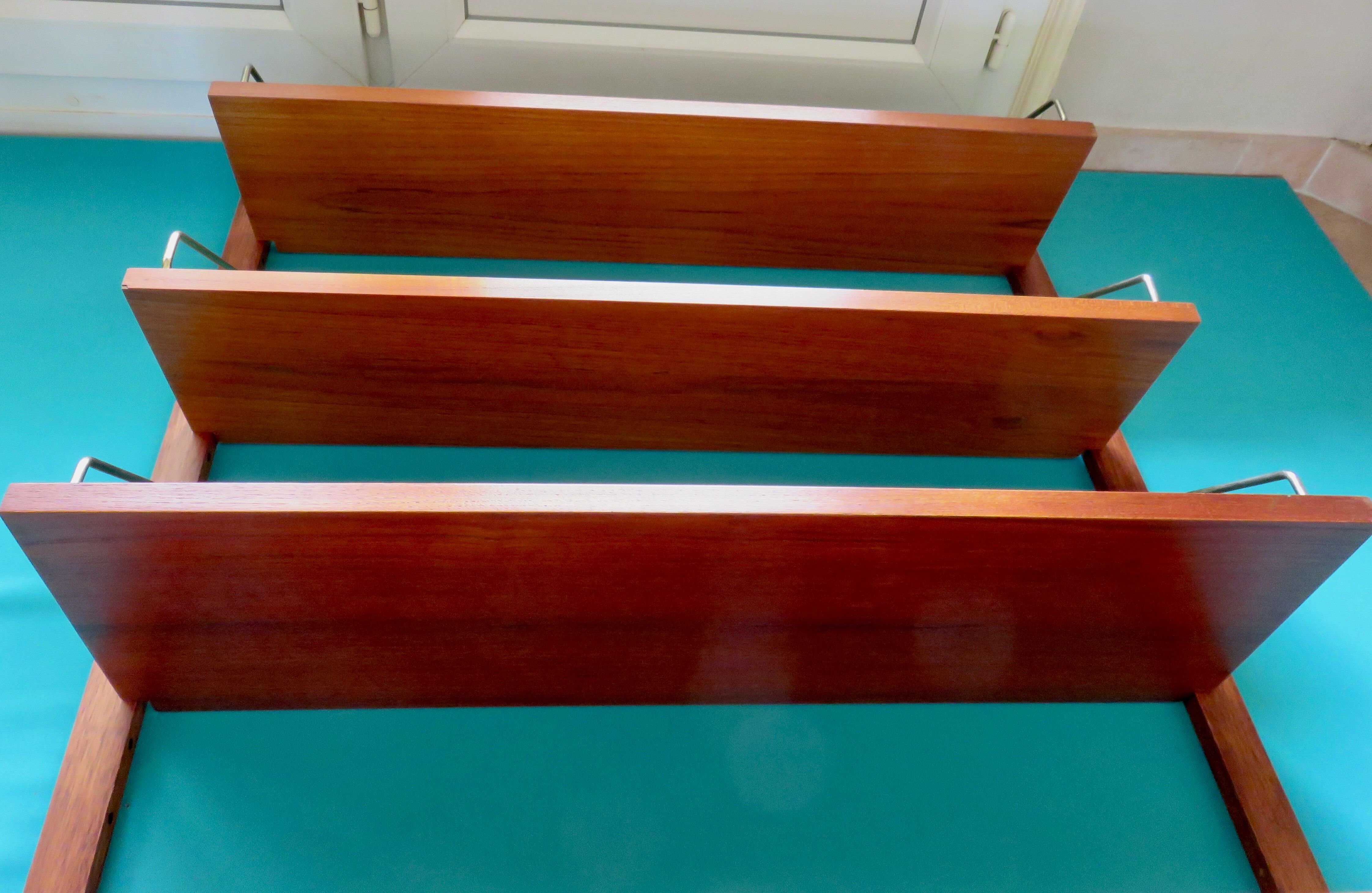 Wall shelving system and teak writing box. of Poul Cadovius. Denmark 1960