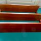 Wall shelving system and teak writing box. of Poul Cadovius. Denmark 1960