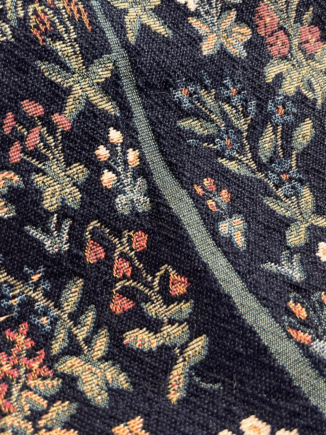 Wall tapestry panel.