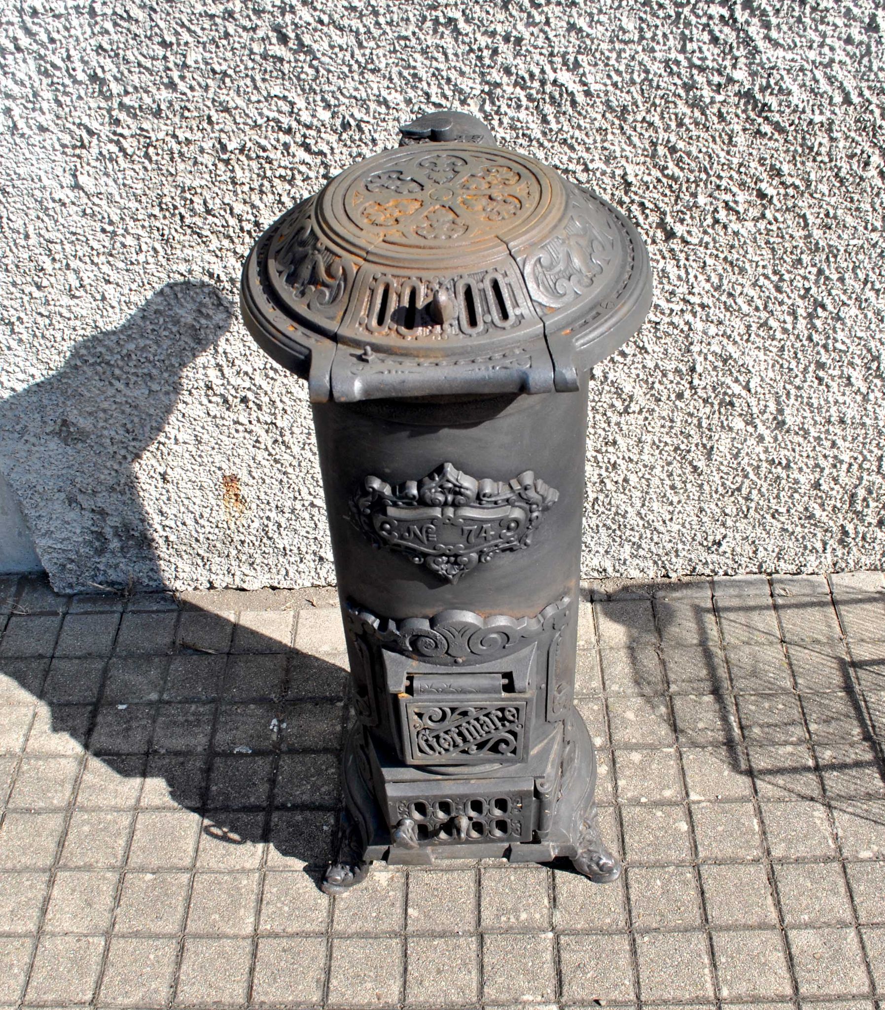Antique decorative stove in black cast iron Germare charcoal