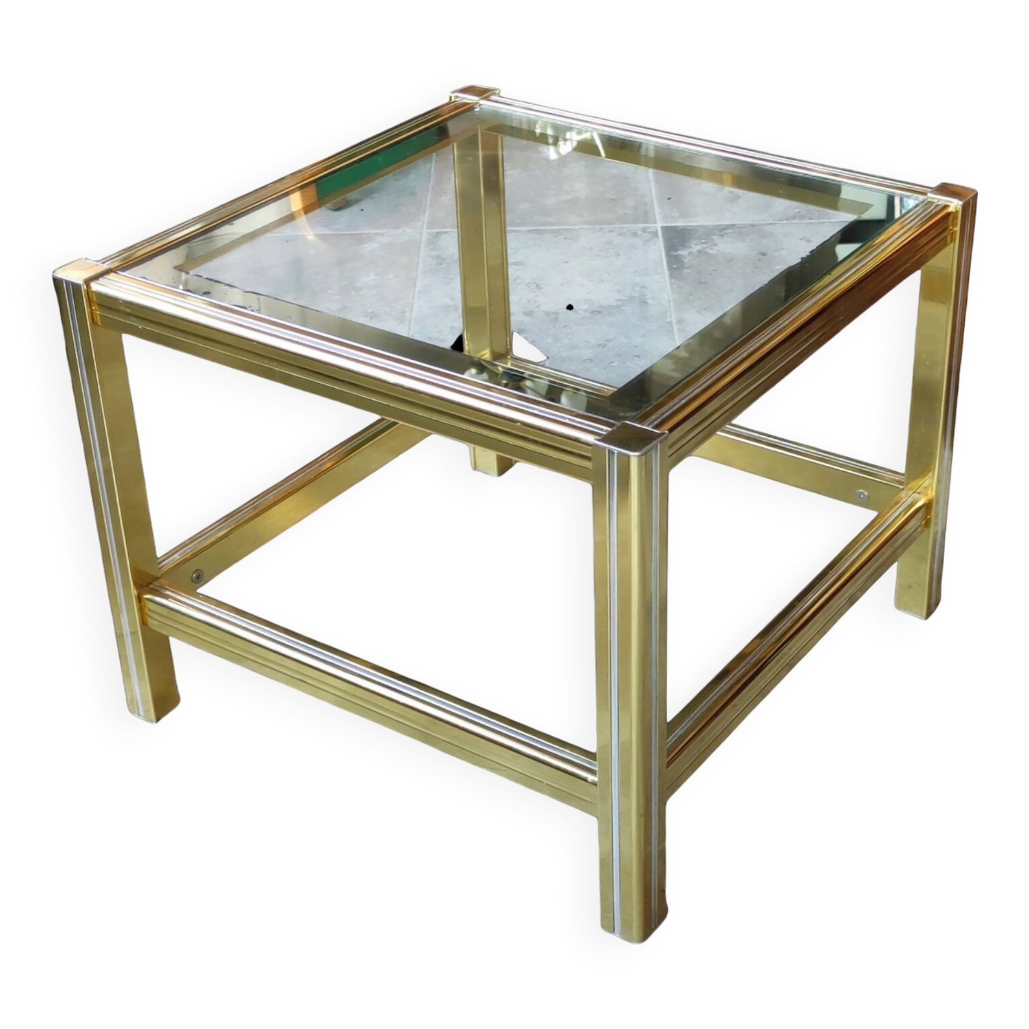 Small designer coffee table in gold metal