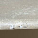 Travertine eye-shaped coffee table
