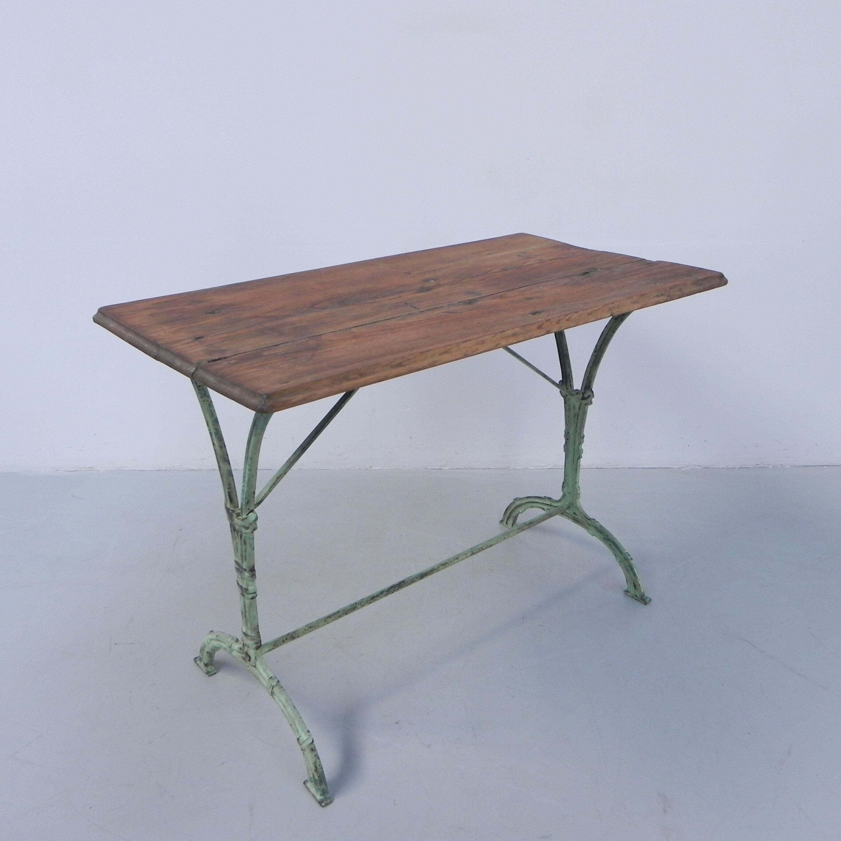 Art nouveau bistro table with cast iron frame