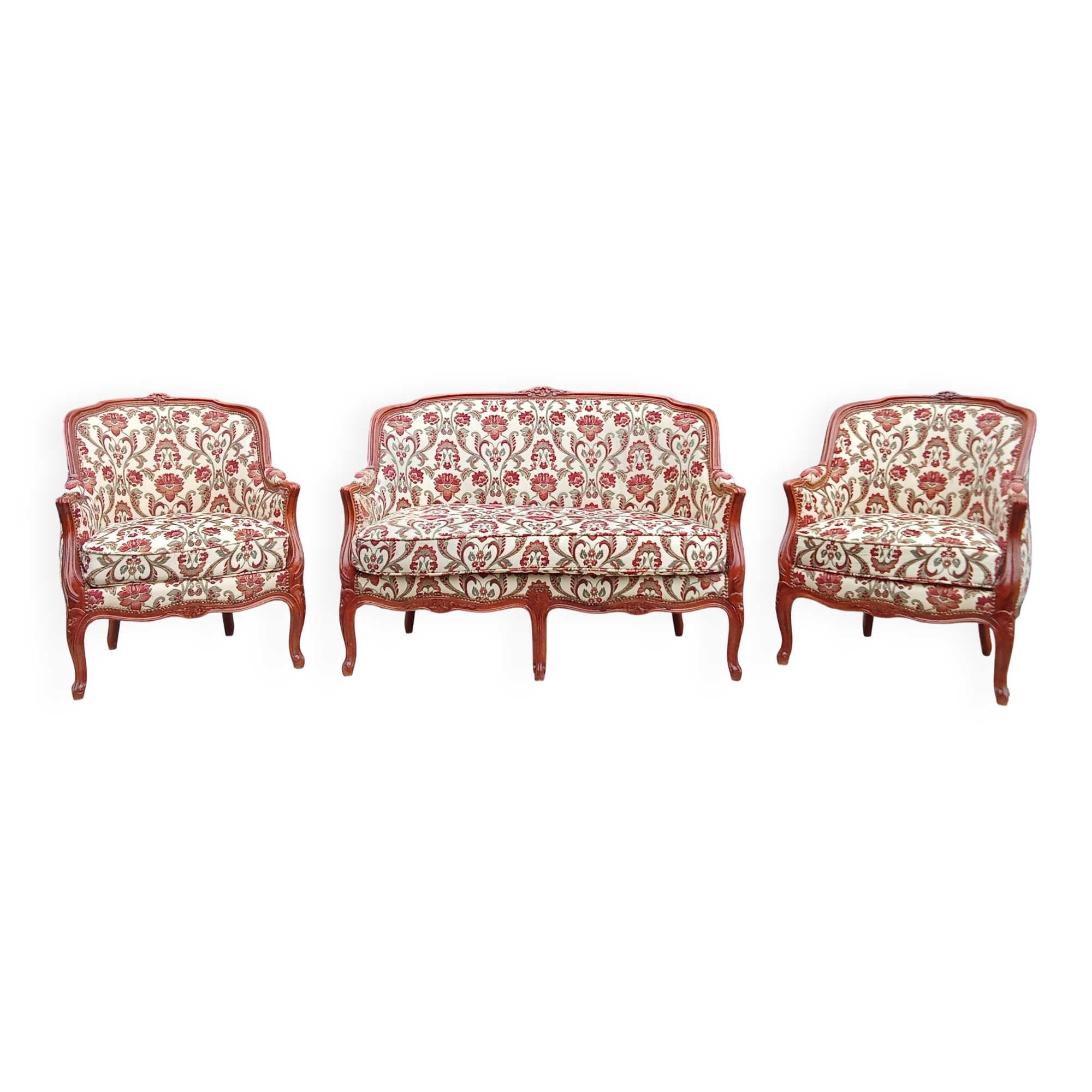 Antique salon with a banquette and Louis XV style bergère chairs.