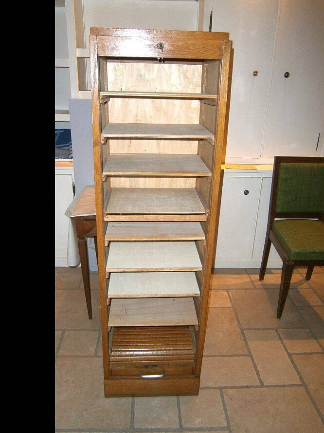 Old solid wood curtained filing cabinet with its key