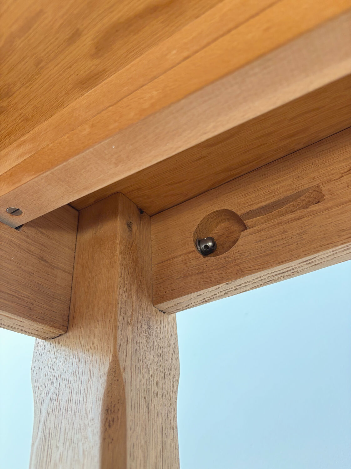 Solid oak farmhouse table with extensions.