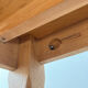 Solid oak farmhouse table with extensions.