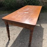 Table de ferme ancienne de style Louis Philippe en cerisier massif avec ses 2 allonges.