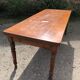 Antique Louis Philippe style farmhouse table in solid cherry wood with its 2 extensions.